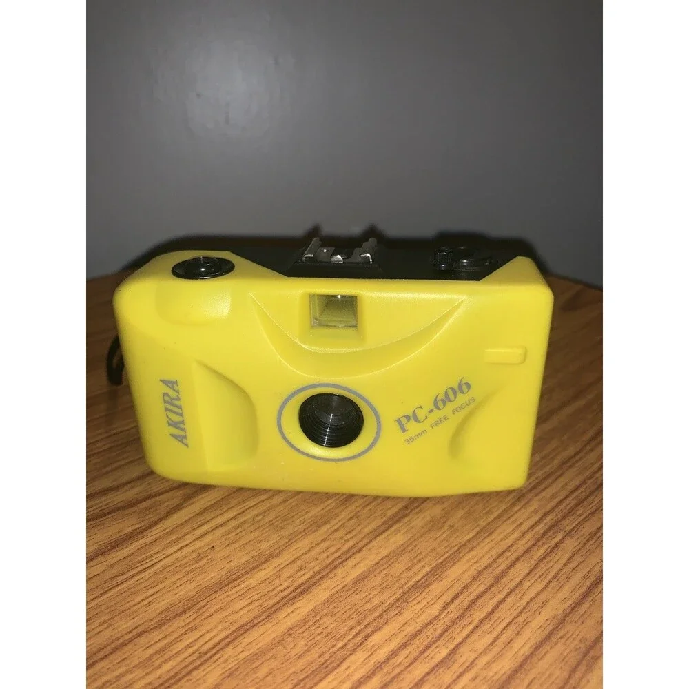 Vintage Working Akira PC-606 Free Focus Yellow 35mm Film Camera FREE S/H